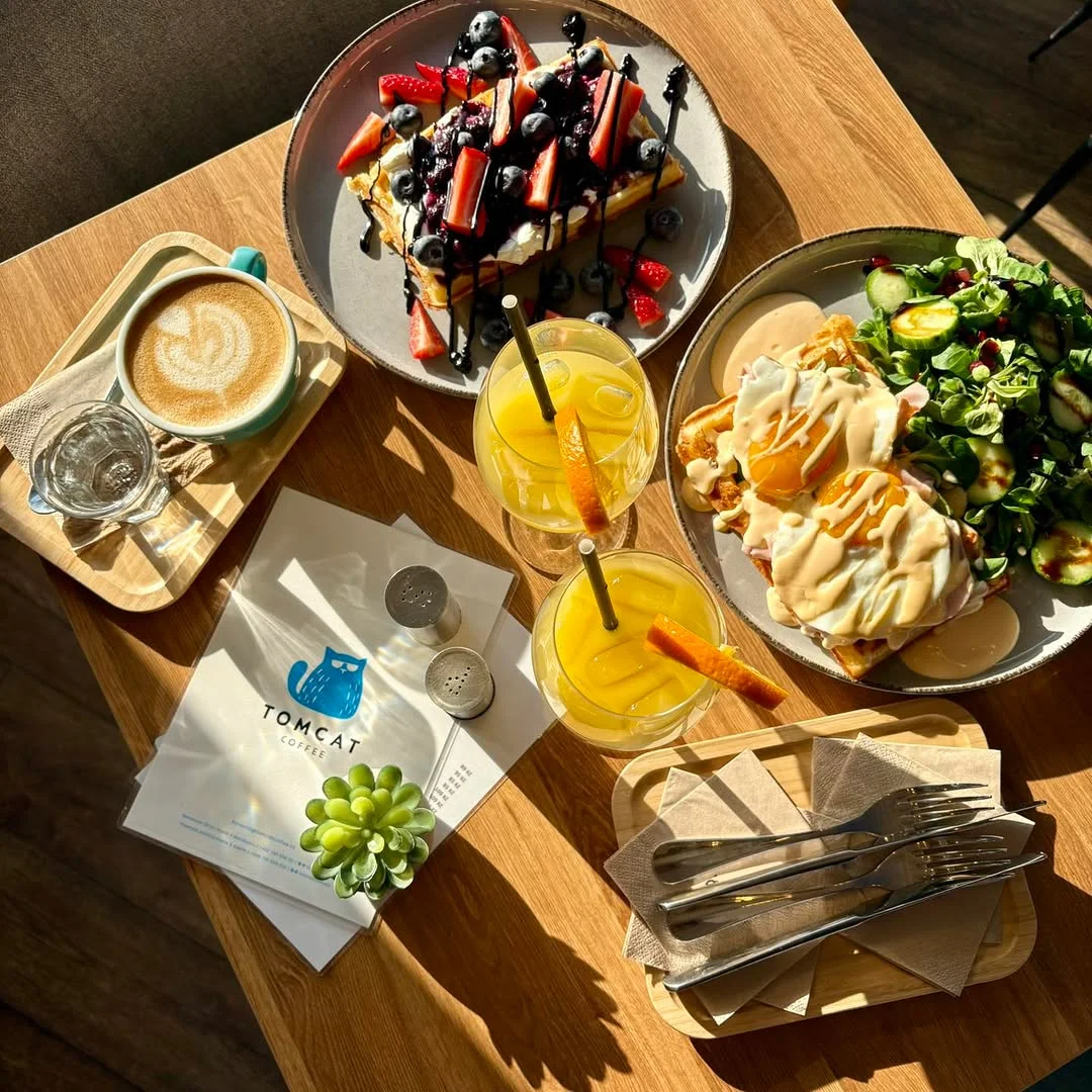 Sunday brunch spread with waffles and eggs